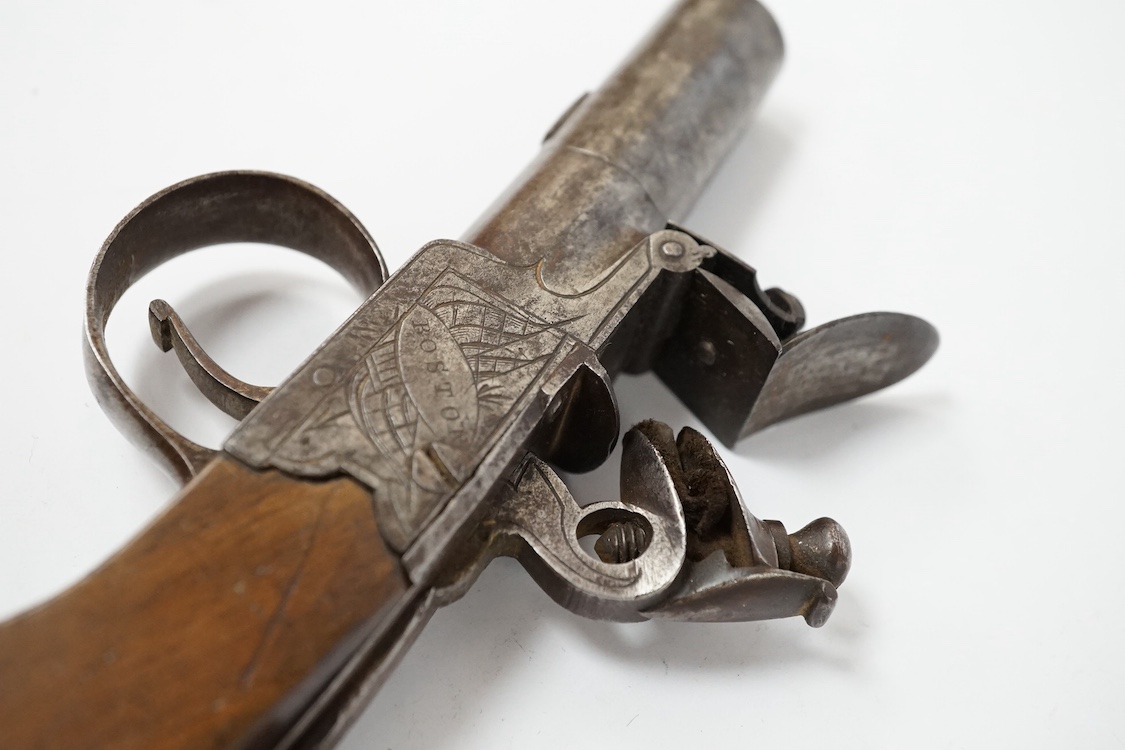 A boxlock flintlock pocket pistol with turn off barrel, Birmingham proof, frame engraved with flag trophy and foliage signed Boston within oval, sliding top thumb safety, slab walnut grip. Condition - fair to good.